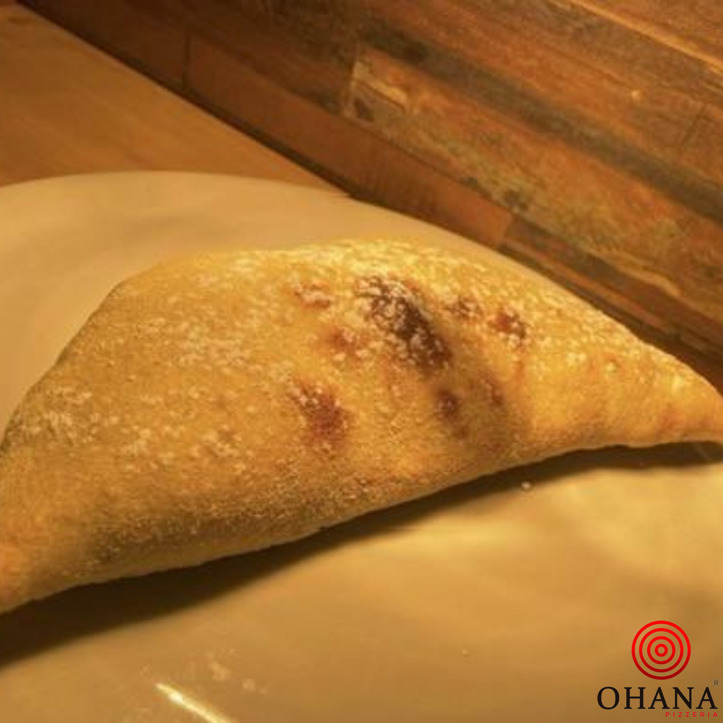 Calzzone Nutella y azucar glass y avellana molida