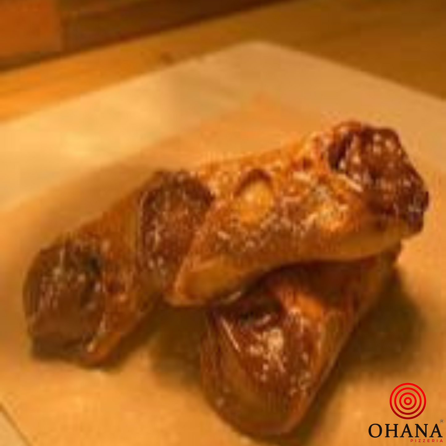 Cannolis rellenos de Nutella y azucar glass